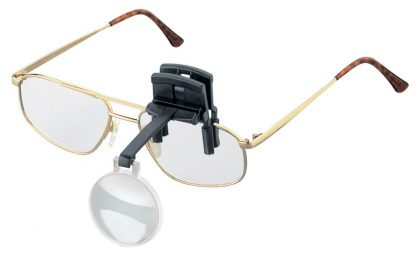 Image of glasses with singular round magnifying lens clipped onto right side of glasses